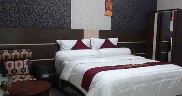 Kamar Tidur Eljie Hotel Syariah Limboto