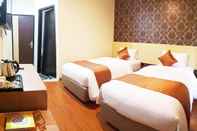 ห้องนอน Eljie Hotel Syariah Gorontalo