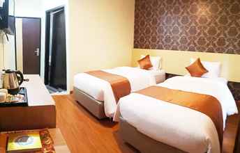 Kamar Tidur 4 Eljie Hotel Syariah Gorontalo