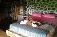 ห้องนอน Kuta Cabana Eco Lodge