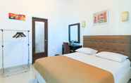 Phòng ngủ 6 Ge JacMart Homestay Makassar
