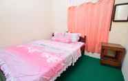 Kamar Tidur 4 Kiki Homestay Syariah