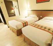 Bedroom 2 Sambi Resort, Spa & Restaurant