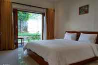 Bedroom Sinar Rinjani Cottages & Restaurant