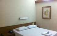 Kamar Tidur 3 Aster Harmony Hotel Bandung