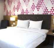 Bedroom 7 Orchardz Hotel Gajahmada Pontianak