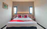 ห้องนอน 7 Cihampelas Hotel 2 Mitra RedDoorz