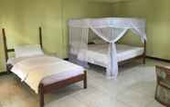 Kamar Tidur 2 Flores Sare Hotel & Restaurant