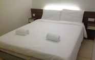 ห้องนอน 2 Qish Hotel