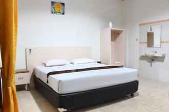 Kamar Tidur 4 Bayak Hotel Bumdes Cipayung & Resort