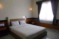 ห้องนอน Hotel Derawan Indah