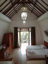 Kamar Tidur 4 Hotel Tidar Manage by Ascent Malang