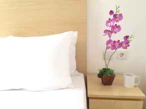 Kamar Tidur 4 The Orchid Hotel