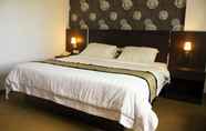 Kamar Tidur 6 Grand Malindo Hotel
