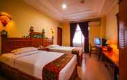ห้องนอน 6 Kharisma Hotel