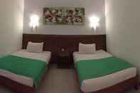 Kamar Tidur Karisma Hotel