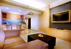 Bedroom 6 Quest Hotel Kuta by ASTON