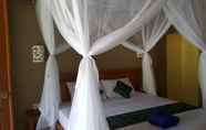 Kamar Tidur 3 Mango Tree Inn		