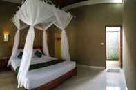 Bedroom Mango Tree Inn		