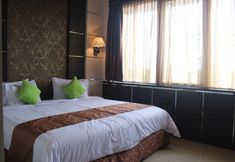 Bedroom 7 Royal Global Hotel