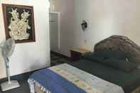 Phòng ngủ Warung Indra Homestay 