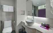 In-room Bathroom 7 Quest Hotel Darmo - Surabaya by ASTON