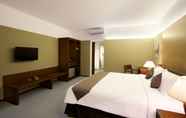 Kamar Tidur 5 Hotel Neo+ Green Savana by ASTON