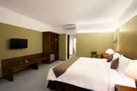 Kamar Tidur Hotel Neo+ Green Savana by ASTON