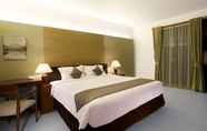 Kamar Tidur 6 Hotel Neo+ Green Savana by ASTON