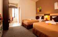 Kamar Tidur 3 LEO Express Hotel