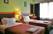 Kamar Tidur 6 LEO Palace Hotel