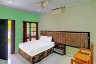 Bedroom OYO 91610 Batukaru Garden Hotel