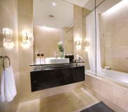 In-room Bathroom 4 The Grove Suites by Grand Aston