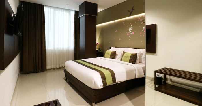 Bedroom Ramedo Hotel Makassar