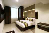 Bedroom Ramedo Hotel Makassar