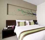 Bedroom 4 Ramedo Hotel Makassar