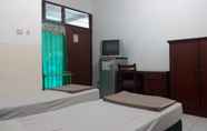 Kamar Tidur 2 Henny Executive Homestay