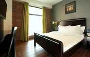 Kamar Tidur 7 Crossroads Hotel