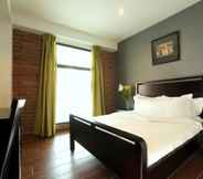 Kamar Tidur 7 Crossroads Hotel