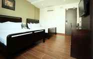 Kamar Tidur 6 Crossroads Hotel