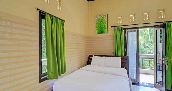 ห้องนอน OYO 91925 Ijo Eco Lodge Hotel