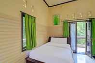 ห้องนอน OYO 91925 Ijo Eco Lodge Hotel