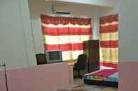 Kamar Tidur SPOT ON 90870 Karim Ct Guest House 