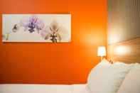 Kamar Tidur Sovotel Boutique Hotel Uptown 101