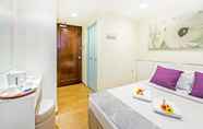 Kamar Tidur 4 Hotel 81 Cosy