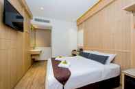 Kamar Tidur Hotel 81 Premier Star