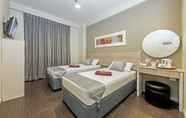 Kamar Tidur 4 Hotel 81 Lucky