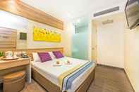 Kamar Tidur Hotel 81 Dickson