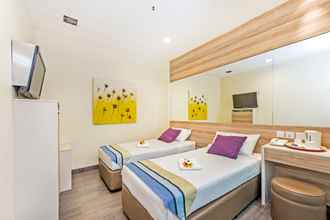 Kamar Tidur 4 Hotel 81 Dickson