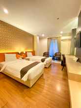 Kamar Tidur 4 The Amrani Syariah Hotel